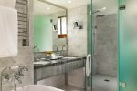 Marble Bathrooms with steam showers and stand alone tubs